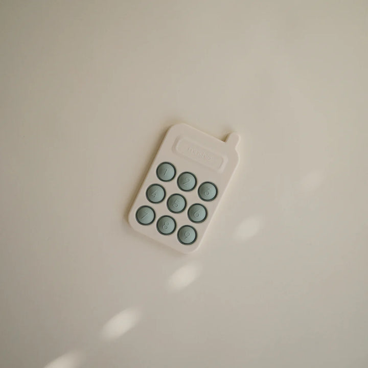 Mushie Phone Press Toy – Cambridge Blue