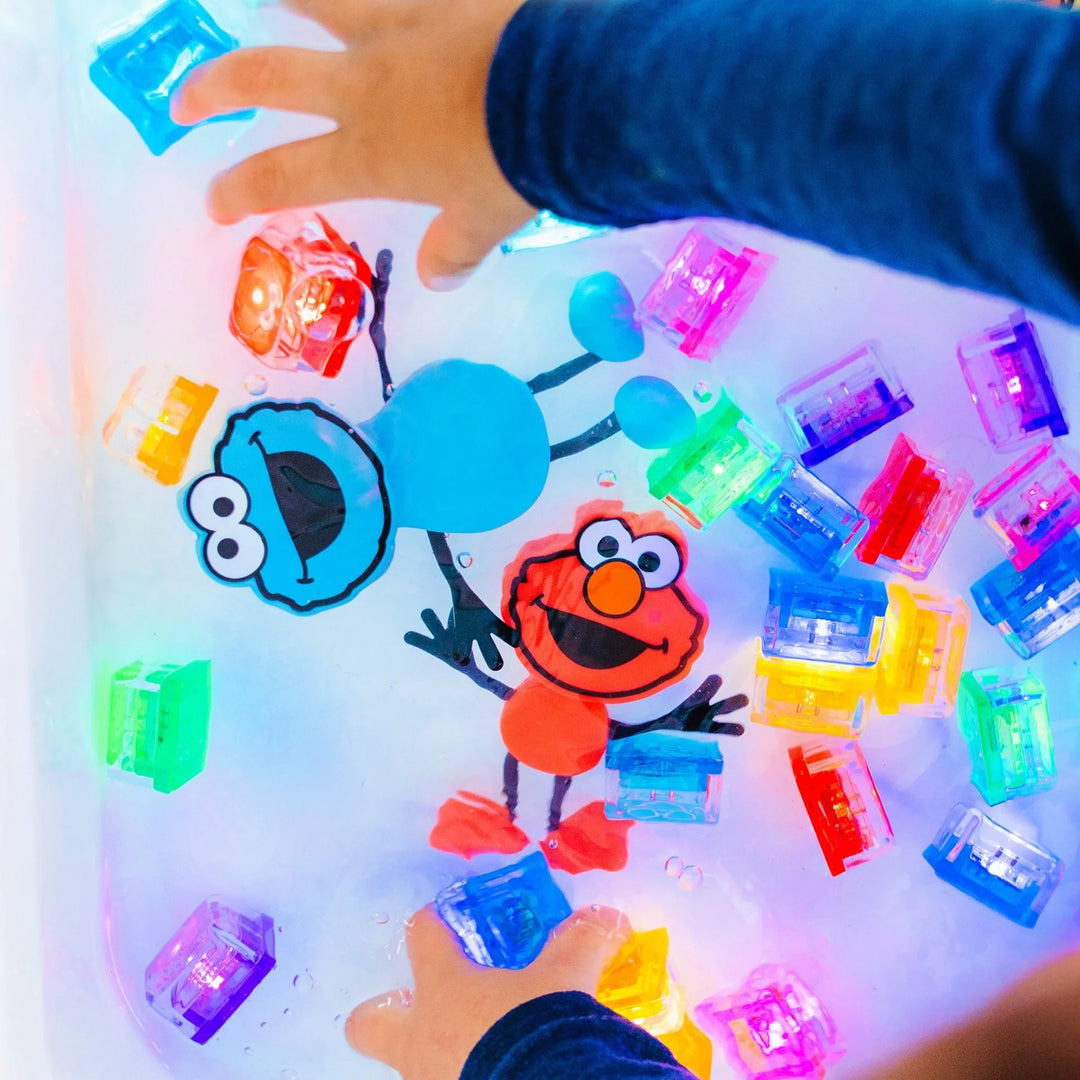 Glo Pals® Sesame Street Water Activated Light-Up Sensory Toys – Elmo